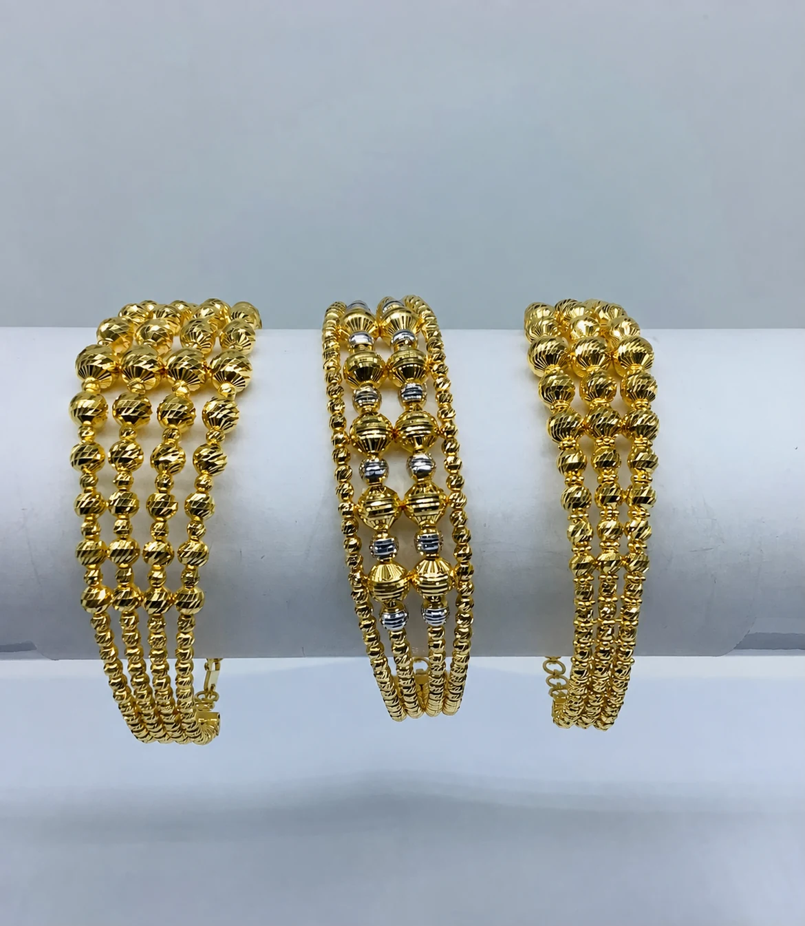 CNC-crafted gold bangles