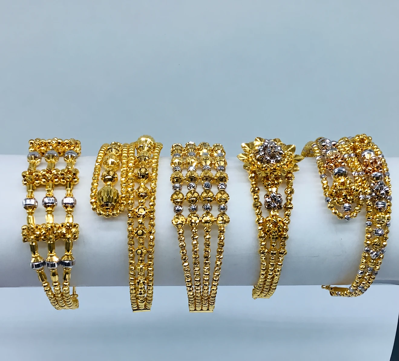 CNC-crafted gold bangles