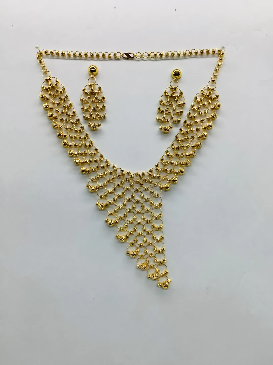 CNC-crafted gold necklace set