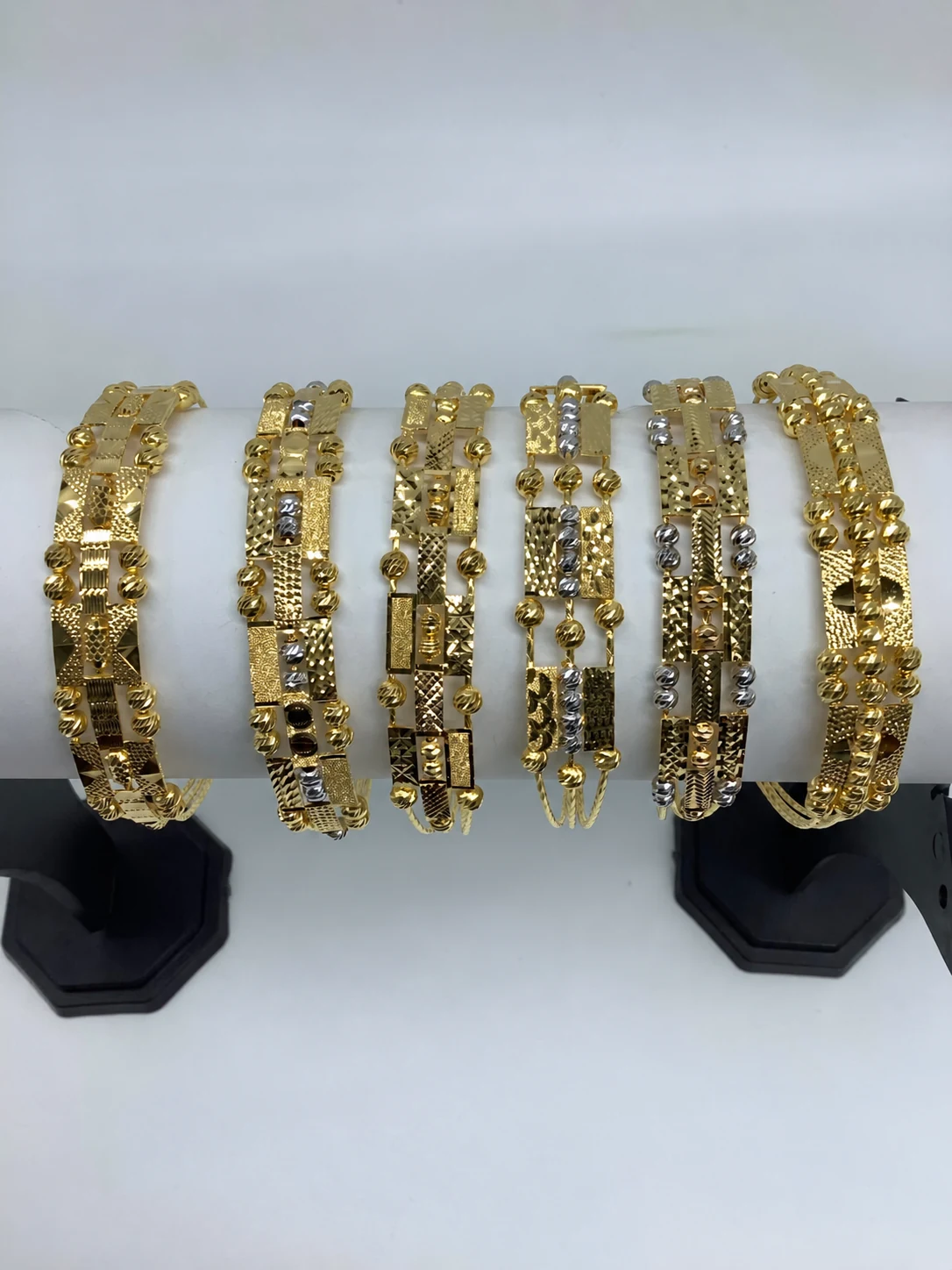 CNC-crafted gold bangles